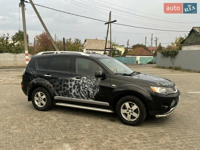 Черный Мицубиси Аутлендер, объемом двигателя 2.4 л и пробегом 230 тыс. км за 6650 $, фото 15 на Automoto.ua