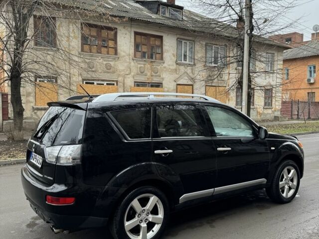 Черный Мицубиси Аутлендер, объемом двигателя 2 л и пробегом 377 тыс. км за 5200 $, фото 5 на Automoto.ua