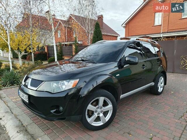 Черный Мицубиси Аутлендер, объемом двигателя 2.36 л и пробегом 192 тыс. км за 8800 $, фото 9 на Automoto.ua