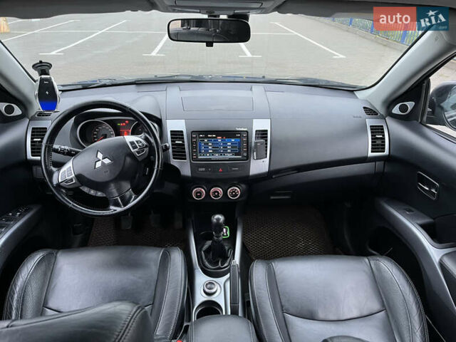 Черный Мицубиси Аутлендер, объемом двигателя 1.97 л и пробегом 244 тыс. км за 8700 $, фото 10 на Automoto.ua