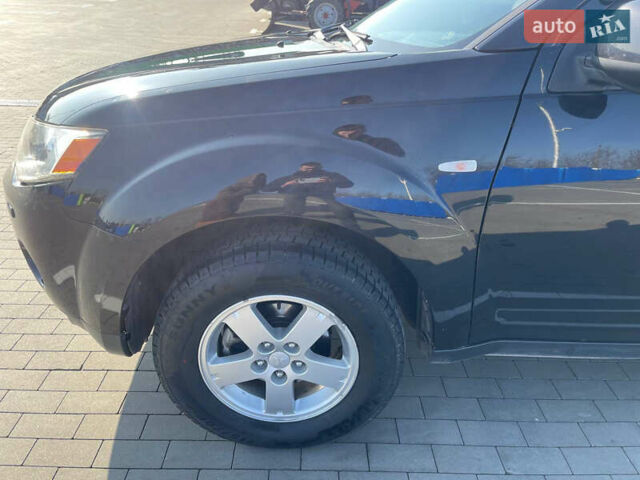 Чорний Міцубісі Аутлендер, об'ємом двигуна 2.4 л та пробігом 195 тис. км за 8600 $, фото 5 на Automoto.ua