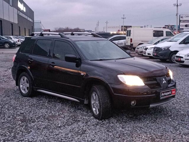 Черный Мицубиси Аутлендер, объемом двигателя 2 л и пробегом 271 тыс. км за 6940 $, фото 11 на Automoto.ua