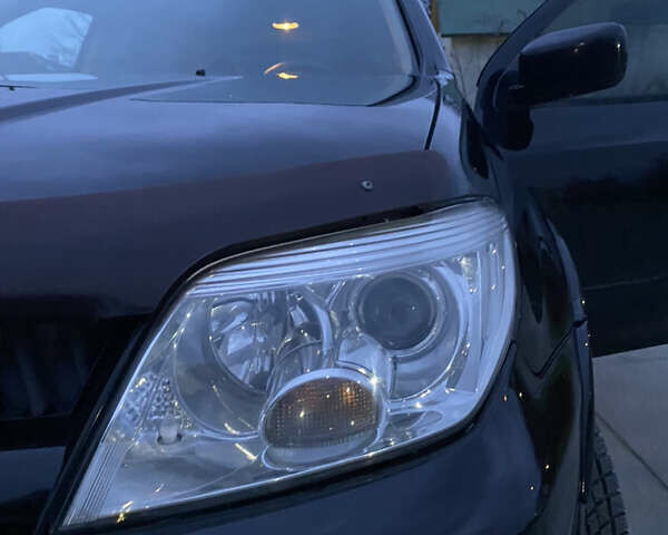 Чорний Міцубісі Аутлендер, об'ємом двигуна 2 л та пробігом 271 тис. км за 6799 $, фото 10 на Automoto.ua