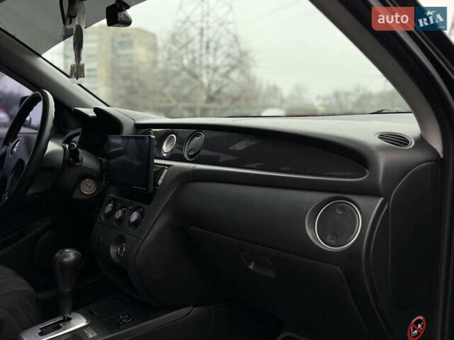 Черный Мицубиси Аутлендер, объемом двигателя 2.4 л и пробегом 245 тыс. км за 6500 $, фото 13 на Automoto.ua