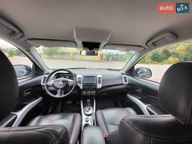 Чорний Міцубісі Аутлендер, об'ємом двигуна 2.4 л та пробігом 205 тис. км за 8400 $, фото 21 на Automoto.ua