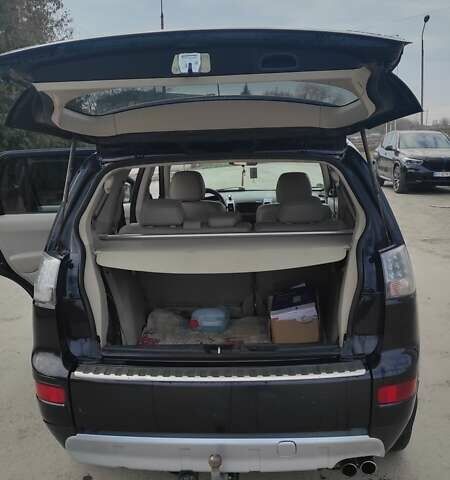 Чорний Міцубісі Аутлендер, об'ємом двигуна 2.2 л та пробігом 275 тис. км за 9900 $, фото 6 на Automoto.ua