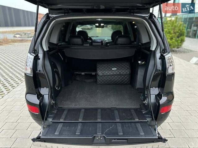 Черный Мицубиси Аутлендер, объемом двигателя 3 л и пробегом 248 тыс. км за 9800 $, фото 47 на Automoto.ua