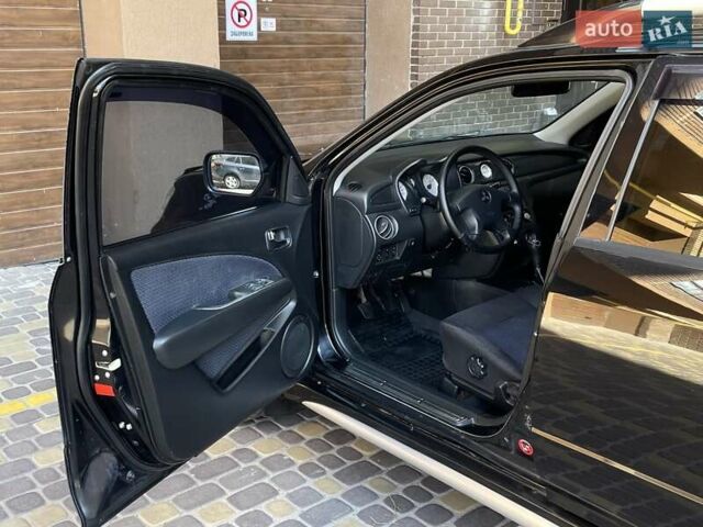 Черный Мицубиси Аутлендер, объемом двигателя 2 л и пробегом 270 тыс. км за 7199 $, фото 20 на Automoto.ua