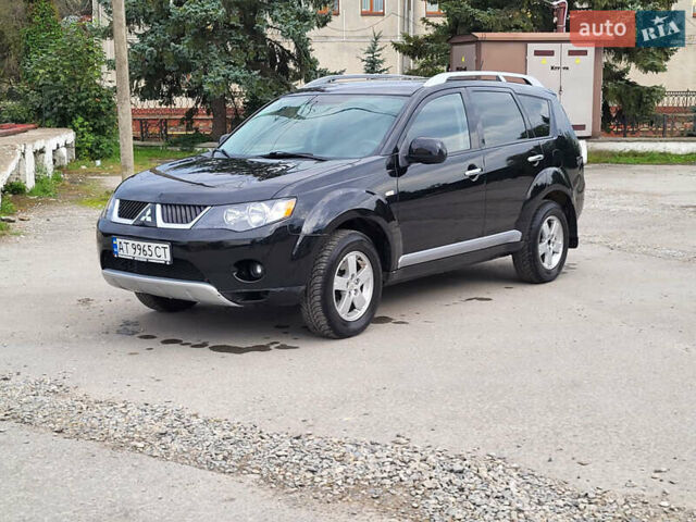 Чорний Міцубісі Аутлендер, об'ємом двигуна 2.4 л та пробігом 205 тис. км за 8400 $, фото 8 на Automoto.ua