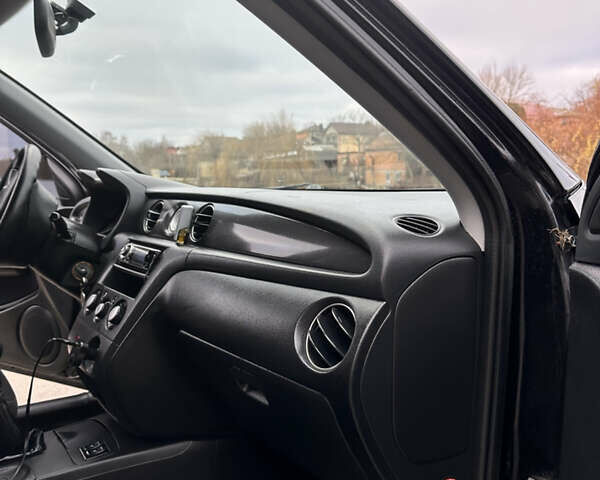 Чорний Міцубісі Аутлендер, об'ємом двигуна 2 л та пробігом 118 тис. км за 8100 $, фото 27 на Automoto.ua