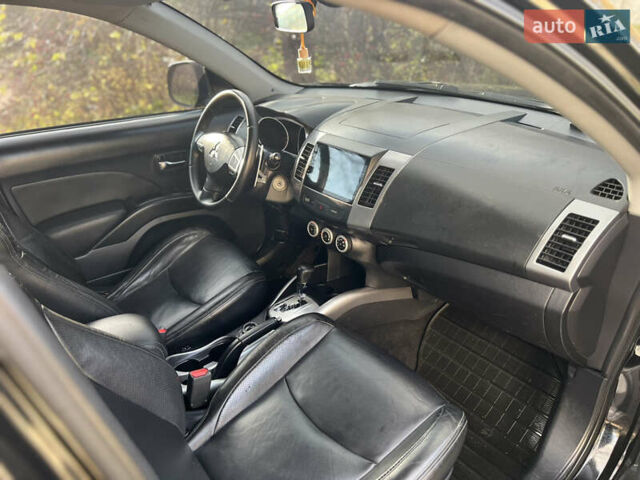 Чорний Міцубісі Аутлендер, об'ємом двигуна 2.4 л та пробігом 221 тис. км за 8700 $, фото 17 на Automoto.ua