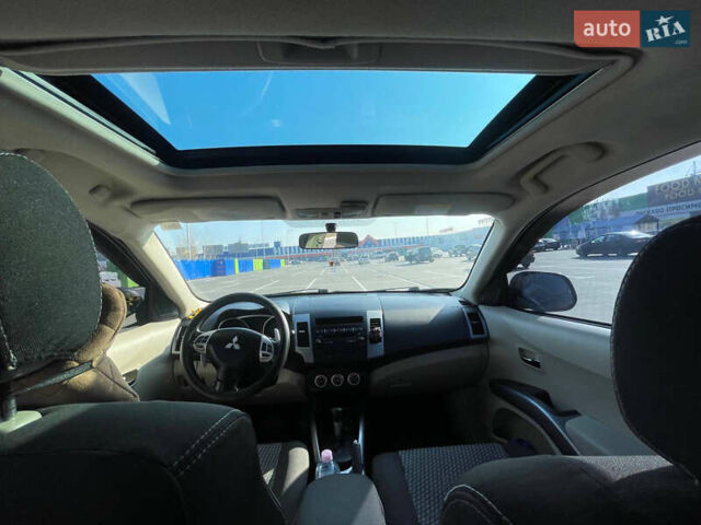 Чорний Міцубісі Аутлендер, об'ємом двигуна 2.4 л та пробігом 195 тис. км за 8600 $, фото 17 на Automoto.ua