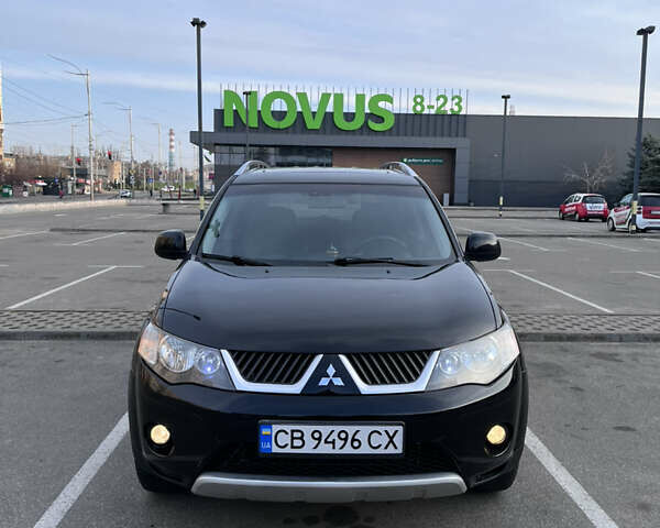 Черный Мицубиси Аутлендер, объемом двигателя 2.4 л и пробегом 237 тыс. км за 5000 $, фото 2 на Automoto.ua