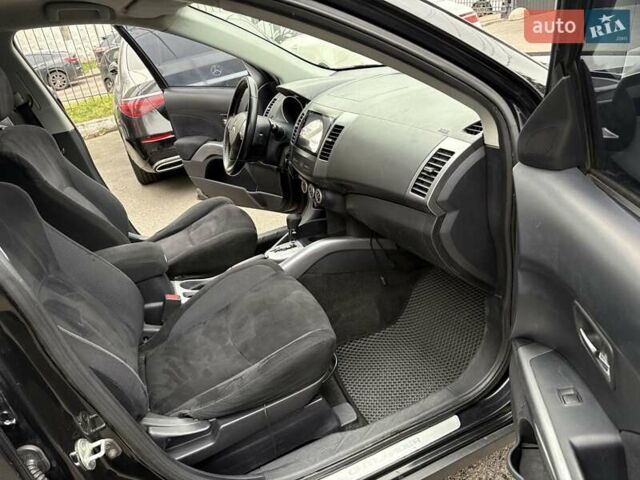 Черный Мицубиси Аутлендер, объемом двигателя 2.4 л и пробегом 185 тыс. км за 7900 $, фото 11 на Automoto.ua