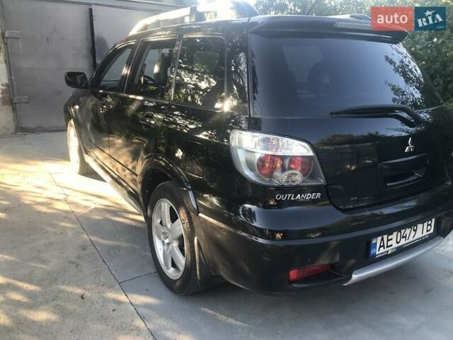 Чорний Міцубісі Аутлендер, об'ємом двигуна 2.38 л та пробігом 207 тис. км за 7000 $, фото 82 на Automoto.ua