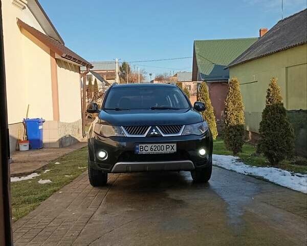 Черный Мицубиси Аутлендер, объемом двигателя 2.35 л и пробегом 245 тыс. км за 8000 $, фото 2 на Automoto.ua
