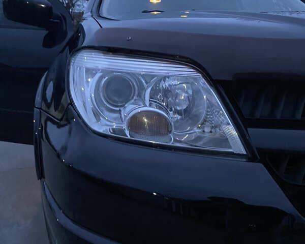 Чорний Міцубісі Аутлендер, об'ємом двигуна 2 л та пробігом 271 тис. км за 6799 $, фото 11 на Automoto.ua