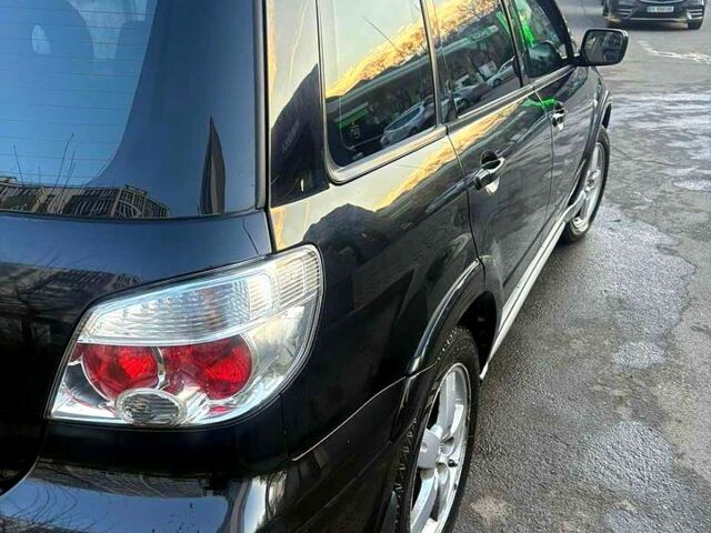 Черный Мицубиси Аутлендер, объемом двигателя 2.4 л и пробегом 231 тыс. км за 8500 $, фото 3 на Automoto.ua