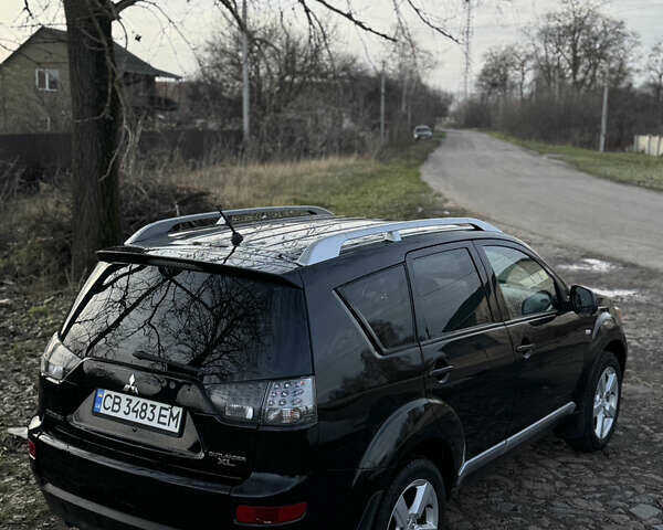 Чорний Міцубісі Аутлендер, об'ємом двигуна 2.36 л та пробігом 293 тис. км за 7900 $, фото 5 на Automoto.ua