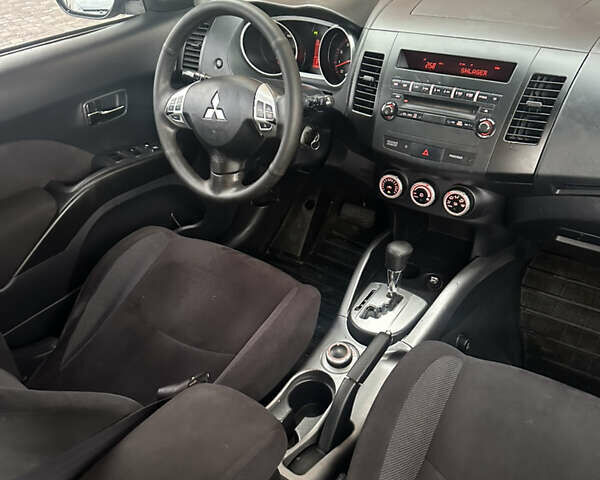 Черный Мицубиси Аутлендер, объемом двигателя 2.4 л и пробегом 199 тыс. км за 8777 $, фото 9 на Automoto.ua