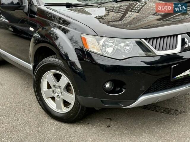 Черный Мицубиси Аутлендер, объемом двигателя 2.4 л и пробегом 185 тыс. км за 7900 $, фото 3 на Automoto.ua