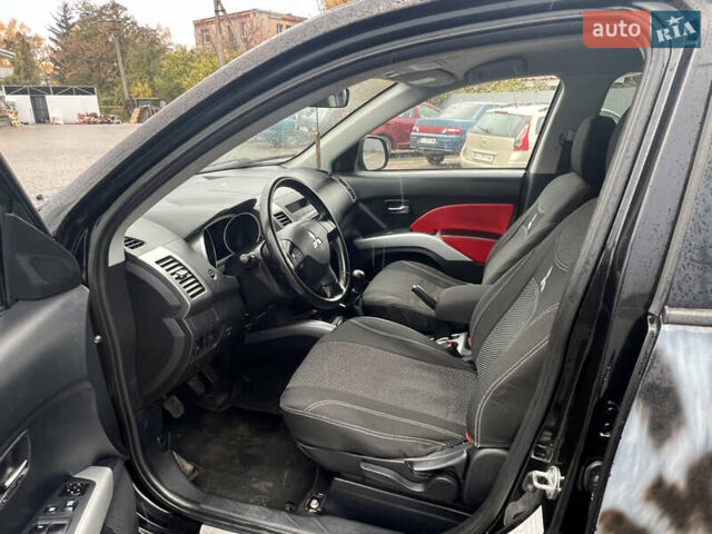 Черный Мицубиси Аутлендер, объемом двигателя 2.4 л и пробегом 230 тыс. км за 6650 $, фото 28 на Automoto.ua