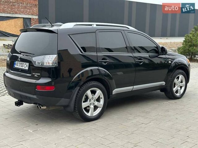 Черный Мицубиси Аутлендер, объемом двигателя 3 л и пробегом 248 тыс. км за 9800 $, фото 23 на Automoto.ua