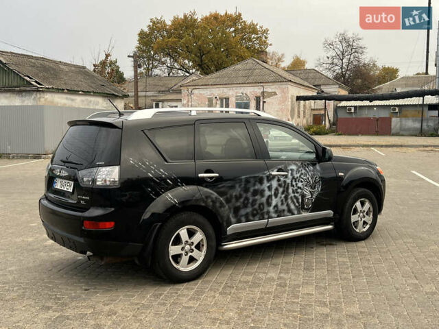 Міцубісі Аутлендер 2008 у Кременчуге на Automoto.ua Чорний Міцубісі Аутлендер, об'ємом двигуна 2.4 л та пробігом 230 тис. км за 6650 $, фото 11 на Automoto.ua