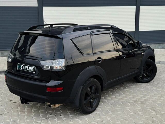 Черный Мицубиси Аутлендер, объемом двигателя 2.4 л и пробегом 199 тыс. км за 6470 $, фото 3 на Automoto.ua