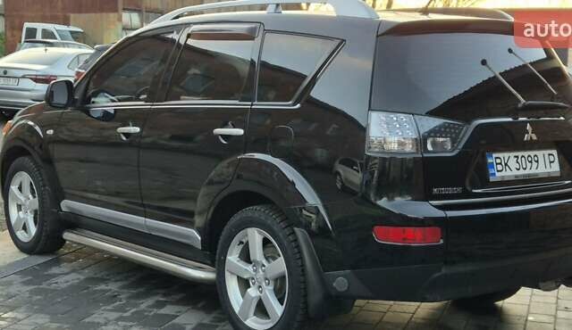Чорний Міцубісі Аутлендер, об'ємом двигуна 2.4 л та пробігом 230 тис. км за 9700 $, фото 6 на Automoto.ua