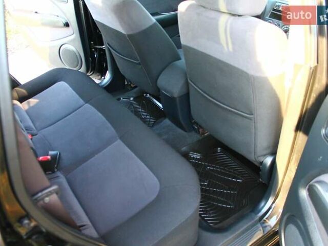 Черный Мицубиси Аутлендер, объемом двигателя 2 л и пробегом 190 тыс. км за 6900 $, фото 39 на Automoto.ua