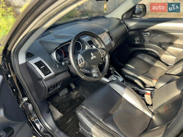Чорний Міцубісі Аутлендер, об'ємом двигуна 2.4 л та пробігом 221 тис. км за 8700 $, фото 19 на Automoto.ua
