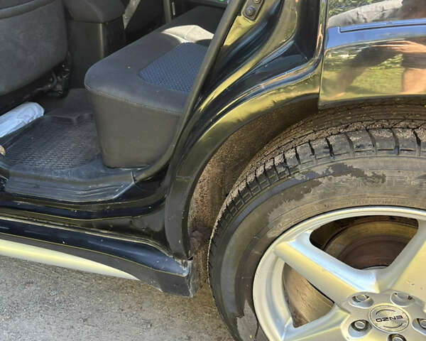 Міцубісі Аутлендер 2008 у Києві на Automoto.ua Чорний Міцубісі Аутлендер, об'ємом двигуна 2 л та пробігом 228 тис. км за 7300 $, фото 10 на Automoto.ua