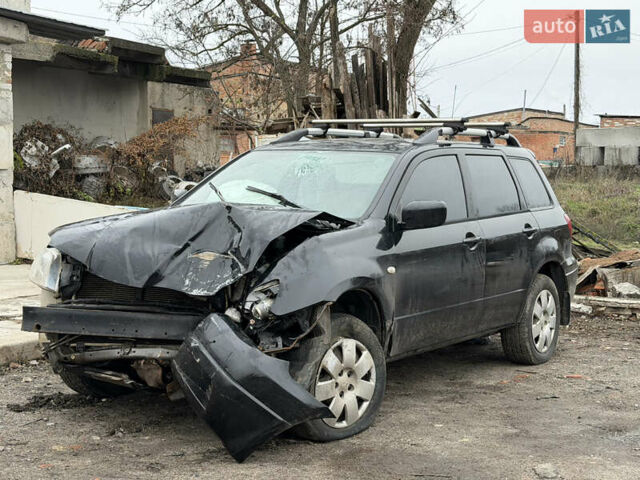 Черный Мицубиси Аутлендер, объемом двигателя 2 л и пробегом 200 тыс. км за 2999 $, фото 8 на Automoto.ua