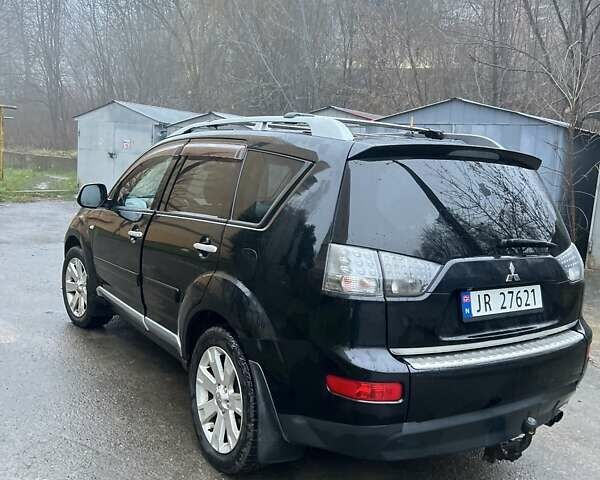 Чорний Міцубісі Аутлендер, об'ємом двигуна 2 л та пробігом 330 тис. км за 4900 $, фото 6 на Automoto.ua