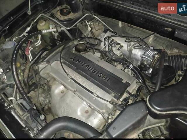 Черный Мицубиси Аутлендер, объемом двигателя 2 л и пробегом 263 тыс. км за 6900 $, фото 4 на Automoto.ua