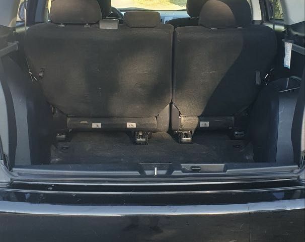 Чорний Міцубісі Аутлендер, об'ємом двигуна 2.4 л та пробігом 325 тис. км за 7500 $, фото 4 на Automoto.ua