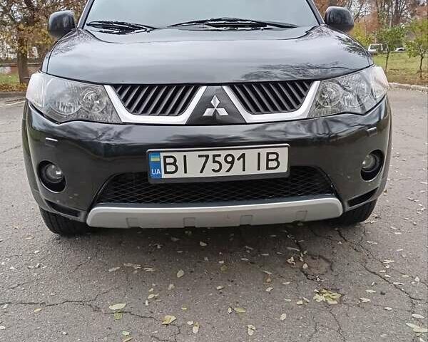 Чорний Міцубісі Аутлендер, об'ємом двигуна 2.36 л та пробігом 265 тис. км за 8800 $, фото 1 на Automoto.ua