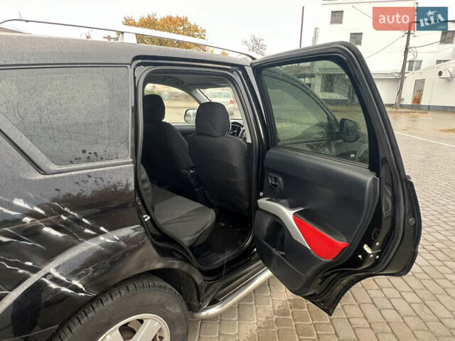 Міцубісі Аутлендер 2008 у Кременчуге на Automoto.ua Чорний Міцубісі Аутлендер, об'ємом двигуна 2.4 л та пробігом 230 тис. км за 6650 $, фото 42 на Automoto.ua