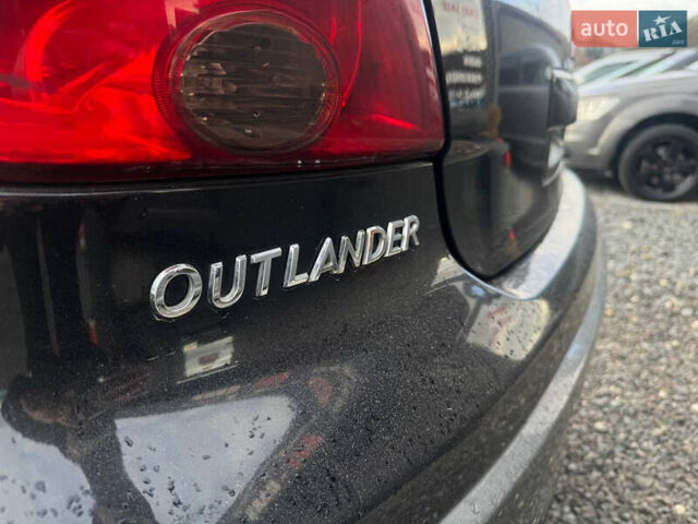 Черный Мицубиси Аутлендер, объемом двигателя 2 л и пробегом 240 тыс. км за 5500 $, фото 24 на Automoto.ua