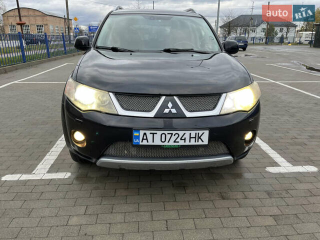 Черный Мицубиси Аутлендер, объемом двигателя 1.97 л и пробегом 244 тыс. км за 8700 $, фото 2 на Automoto.ua