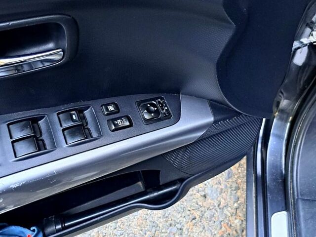 Черный Мицубиси Аутлендер, объемом двигателя 2.4 л и пробегом 241 тыс. км за 9300 $, фото 6 на Automoto.ua