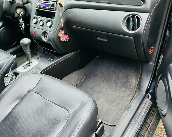 Чорний Міцубісі Аутлендер, об'ємом двигуна 2.4 л та пробігом 200 тис. км за 6790 $, фото 8 на Automoto.ua