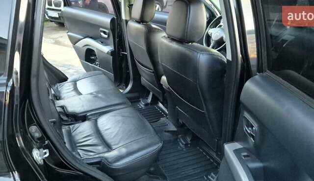 Чорний Міцубісі Аутлендер, об'ємом двигуна 2.4 л та пробігом 230 тис. км за 9700 $, фото 9 на Automoto.ua