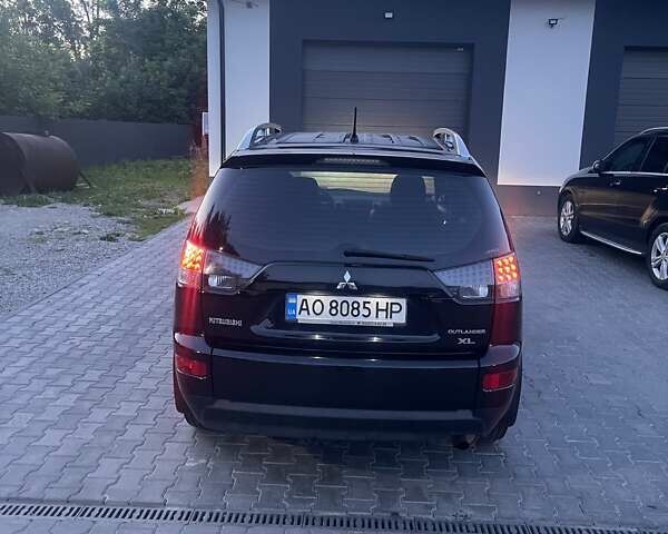 Черный Мицубиси Аутлендер, объемом двигателя 2.4 л и пробегом 290 тыс. км за 9500 $, фото 9 на Automoto.ua