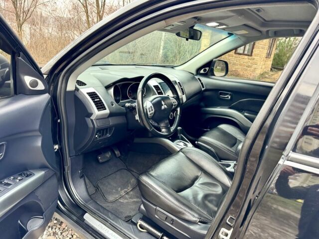 Чорний Міцубісі Аутлендер, об'ємом двигуна 2.4 л та пробігом 229 тис. км за 9790 $, фото 9 на Automoto.ua