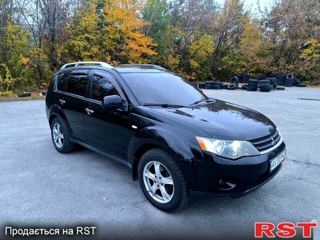 Черный Мицубиси Аутлендер, объемом двигателя 2.4 л и пробегом 210 тыс. км за 7800 $, фото 3 на Automoto.ua