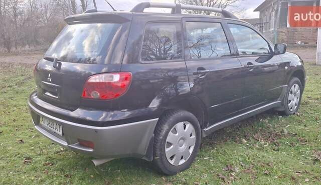 Міцубісі Аутлендер 2008 у Галиче на Automoto.ua Чорний Міцубісі Аутлендер, об'ємом двигуна 2 л та пробігом 112 тис. км за 7350 $, фото 3 на Automoto.ua