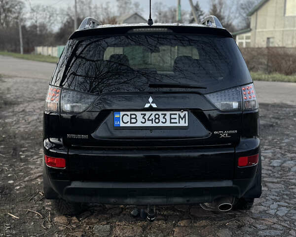 Чорний Міцубісі Аутлендер, об'ємом двигуна 2.36 л та пробігом 293 тис. км за 7900 $, фото 3 на Automoto.ua