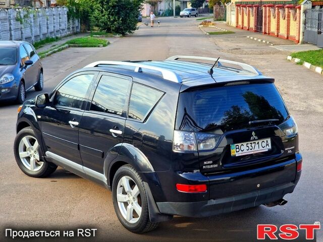 Черный Мицубиси Аутлендер, объемом двигателя 2.4 л и пробегом 189 тыс. км за 7000 $, фото 8 на Automoto.ua